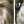 Before and after image of a person with straight gray hair that is thinning on the crown
